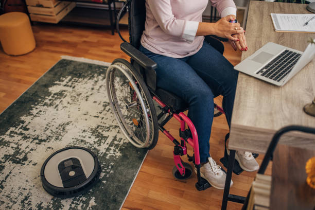 istock Disabled woman in home office 1437881688