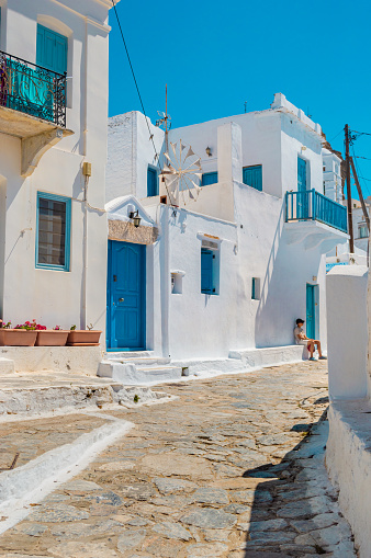 Beautiful stone-built street with old traditional houses in Chora of Amorgos in Greece 22 July 2022