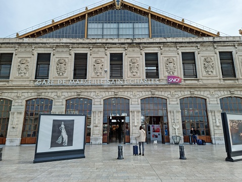 Inside Marseille-Saint-Charles station. The image shows the main entrance to the station. The station has 16 tracks and gives access to a metro station.