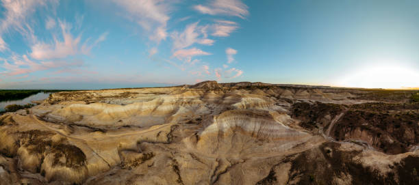 istock Panoramic view of yellow arid badlands with striking geological formations with beautiful skyline. 1437894204