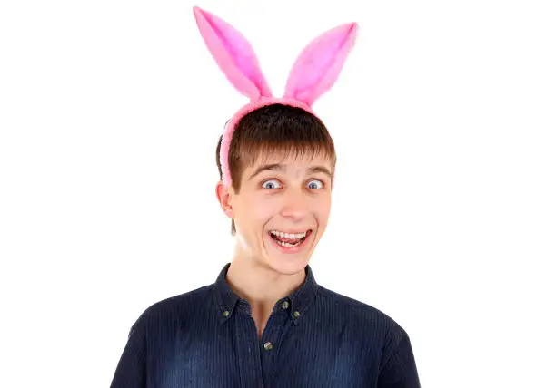 Young Man with Rabbit Ears Isolated on the White Background
