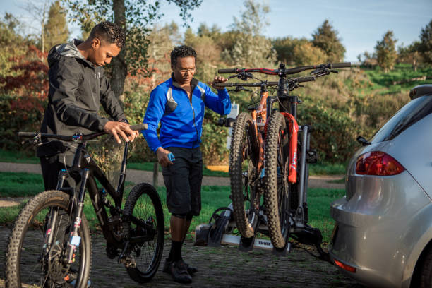 istock Two black mountain bikers preparing for an adventure 1437897025