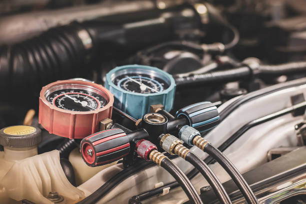 istock Car air conditioner check service, leak detection, fill refrigerant. 1437897050