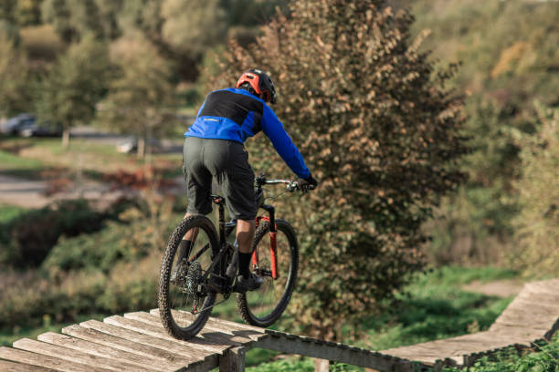 istock An adventurous black mountain biker alone on the trail 1437898084