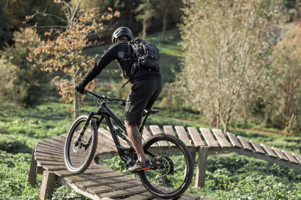 istock An adventurous black mountain biker alone on the trail 1437898653