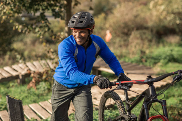 istock An adventurous black mountain biker alone on the trail 1437898830