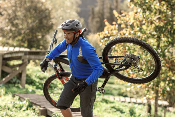 istock An adventurous black mountain biker alone on the trail 1437899072