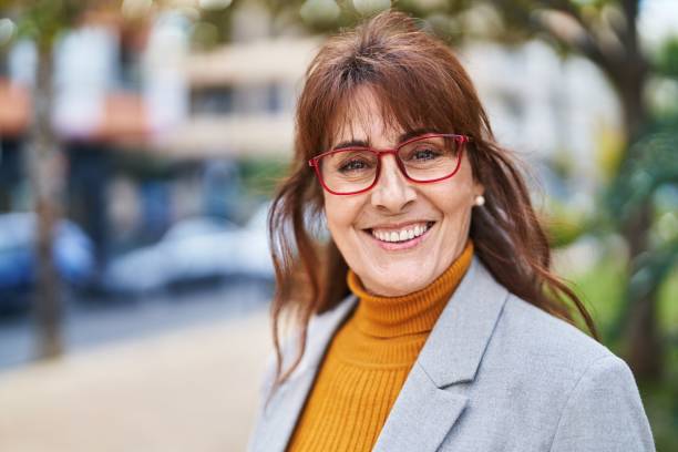 istock Middle age woman business executive smiling confident at park 1437899242
