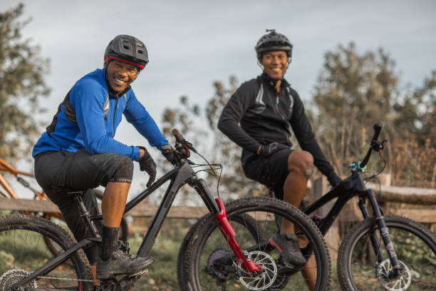 istock Two black mountain bikers on the trail 1437899583