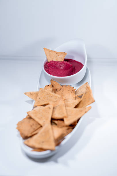 istock beetroot pruple nachos sauce dip elegant white plate 1437900478
