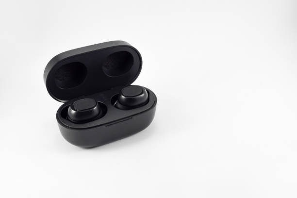 istock Wireless earphone bluetooth voice control with charger 1437903642