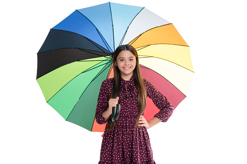 happy teen girl under bright color umbrella in fall season isolated on white, autumn.