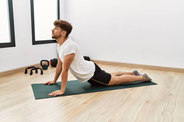 istock Young arab man stretching at sport center 1437908309