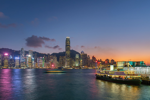 Scenery of Victoria Harbor of Hong Kong city at dusk