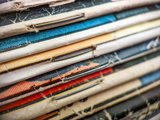 istock Old vintage comic books stack creates colorful background paper texture with abstract shapes 1437917585