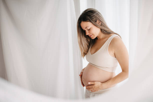 istock Beautiful pregnant woman 1437918065