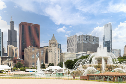 CHICAGO, IL, USA - JULY 1, 2022: The Buckingham Fountain, in the Grant Park area of downtown Chicago, with the skyline in the background.