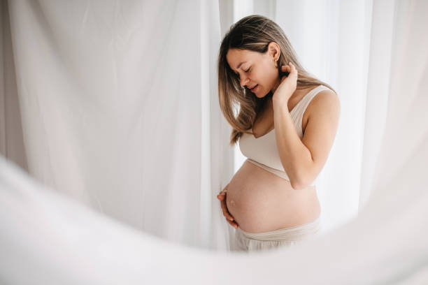 istock Beautiful pregnant woman 1437918227