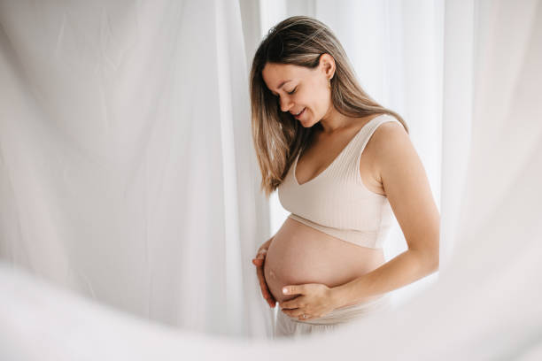 istock Beautiful pregnant woman 1437918764