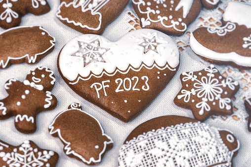 PF 2023 on Christmas gingerbread cookie with heart shape