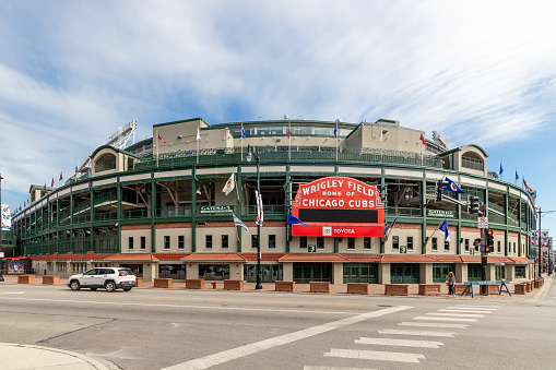 Chicago - Circa April 2022: Chicago Cubs center field marquee on the northwest corner of Wrigley field. Wrigley Field has been home to the Cubs since 1916.