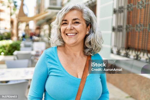 Middle Age Greyhaired Woman Smiling Happy Standing At The City Stock Photo - Download Image Now