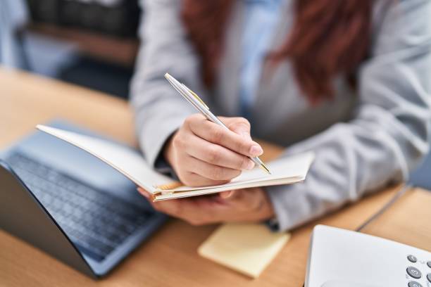 istock Young hispanic woman business working at office 1437927434