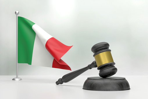 Black Wooden Gavel And Italian Flag On White Background. Justice Concept. Justice Concept.