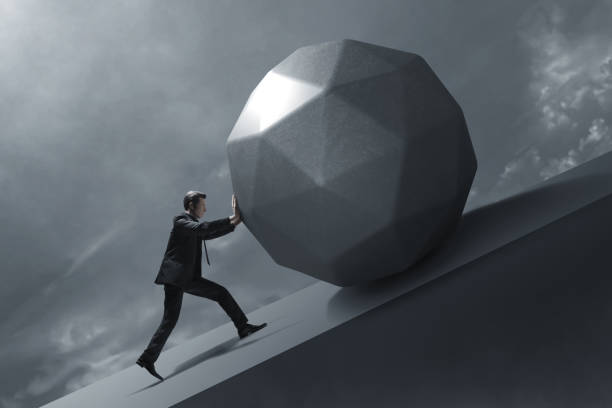 istock Business man pushing big gemstone 1437928519