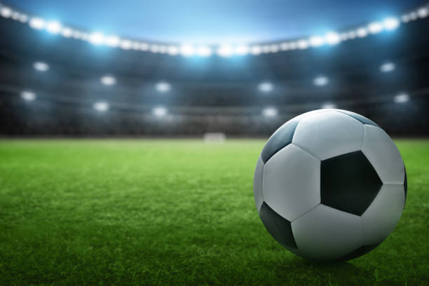 istock Soccer ball on the field 1437928530