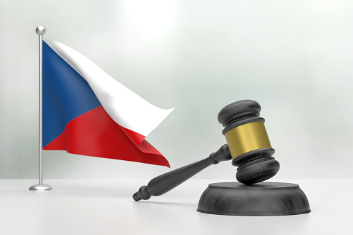 Black Wooden Gavel And Czech Republic Flag On White Background. Justice Concept. Justice Concept.