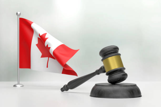 istock Gavel And Canadian Flag On White Background. Justice Concept. 1437928714