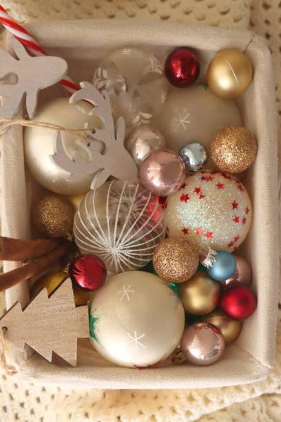 istock Basket of Christmas Decorations and Blanket 1437929290