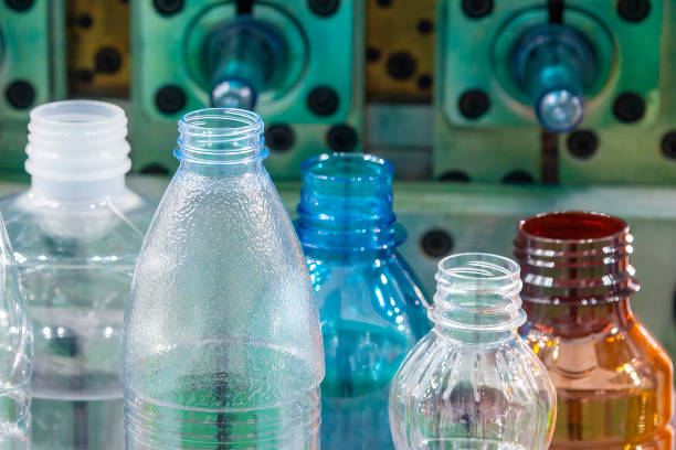 istock The various type of plastic bottles with injection mold background. 1437929751