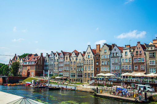 Gdansk, Poland - August 4, 2018: Panorama of Old Town of Gdansk, Dlugie Pobrzeze and Motlawa River