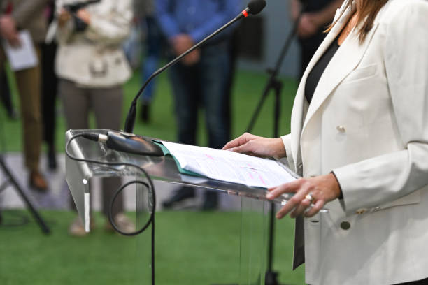 istock Female politician speaking publicly 1437930582