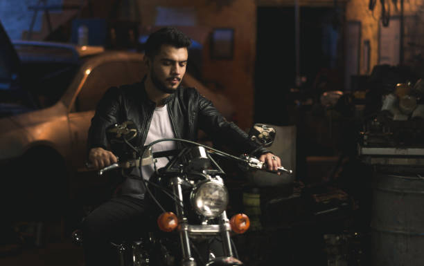 istock Male sitting on a motorcycle 1437930679