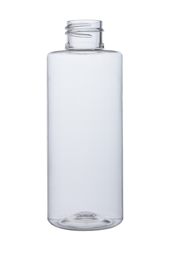 Empty open bottle made of transparent plastic for liquids and hygiene. Isolated on a white background.