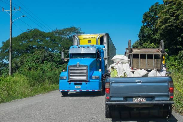 Puntarenas, Costa Rica - September 08, 2022: Truck and pickup traffic on a highway on the coast of Quepos
