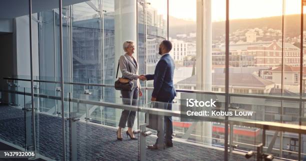Businesspeople Handshake And Welcome Onboarding During A Meeting At The Office B2b Professional Man And Woman Greeting For Successful Deal Merger Or Agreement For A Company Contract Stock Photo - Download Image Now