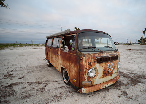 Dunedin, FL, September 2022 - Paint job gives rusty Old Volkswagen Minibus antique appearence