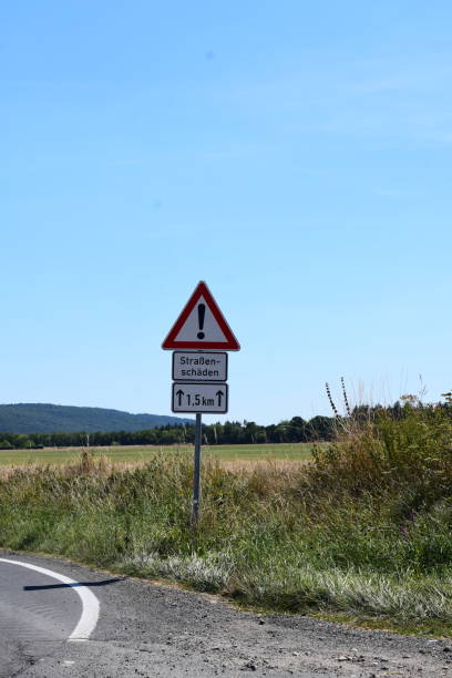 istock bad road warning sign 1437938304