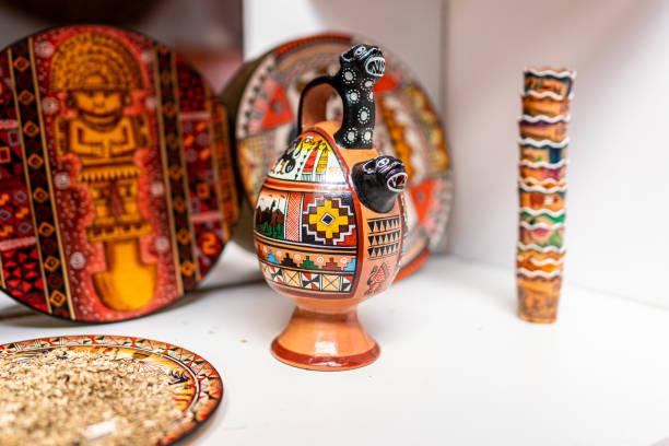 A close-up of a female artist carefully painting on a cute ceramic piece, showcasing her creative artistry.