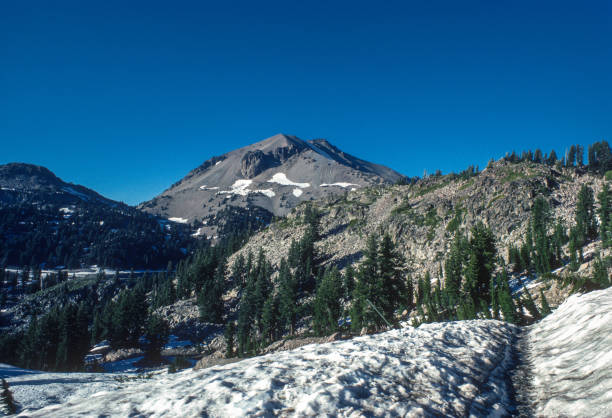 istock Lassen Volcanic NP - Mount Lassen & Snow Trail - 1983 1437941248