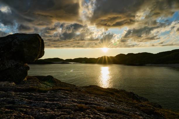 istock Boulder and hills above Oldshoremore Beach Bay at sunset 1437943216