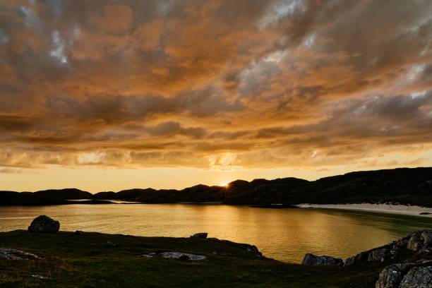 istock Boulder and hills above Oldshoremore Beach Bay at sunset 1437943444