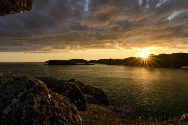 istock Boulder and hills above Oldshoremore Beach Bay at sunset 1437943483