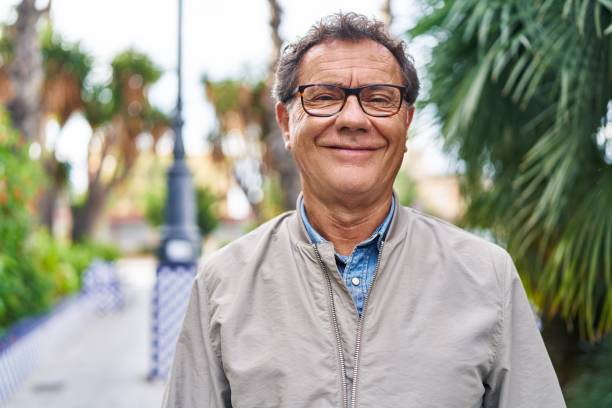 istock Middle age man smiling confident walking at street 1437945532