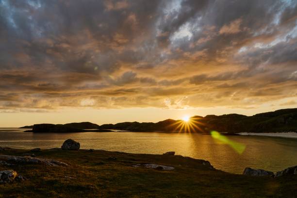 istock Boulder and hills above Oldshoremore Beach Bay at sunset 1437945594