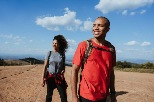 istock Backpacker couple on mountain trail 1437945850
